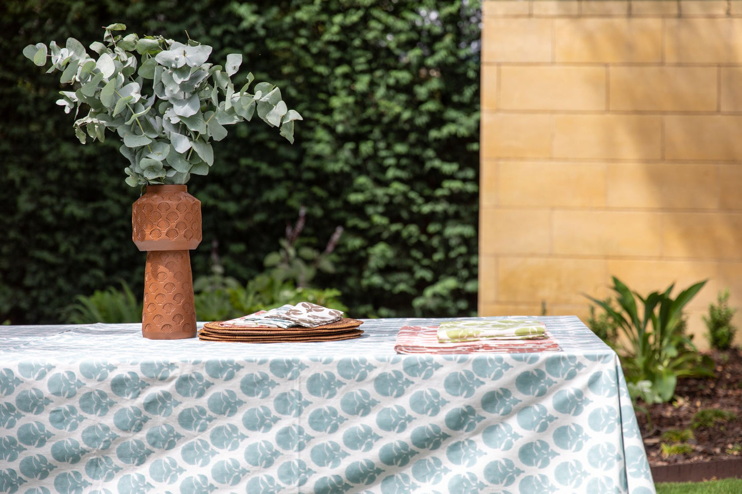 Mandalay Designs Buttercup Table Linen - Terracotta